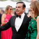 Carlos and Carole Ghosn, wearing outfits similar to the ones from their wedding party at the Palace of Versailles.